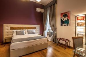 Uma cama ou camas num quarto em Hotel Paba