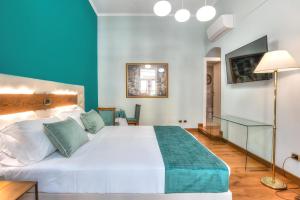 Uma cama ou camas num quarto em Hotel Paba
