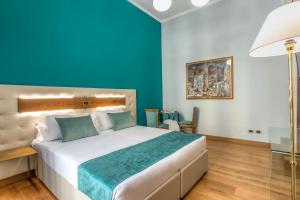 Uma cama ou camas num quarto em Hotel Paba