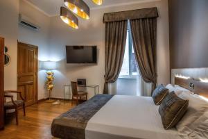 Uma cama ou camas num quarto em Hotel Paba