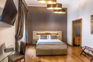 Uma cama ou camas num quarto em Hotel Paba