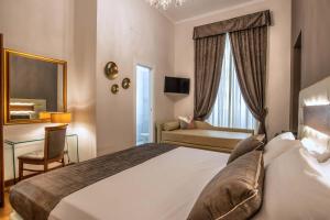 Uma cama ou camas num quarto em Hotel Paba