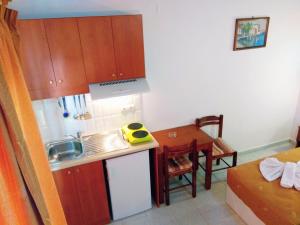 A kitchen or kitchenette at Villa Giorgos