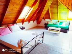 A bed or beds in a room at Apartments Onar