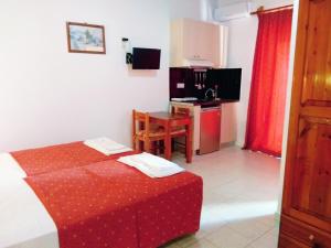 A kitchen or kitchenette at Villa Giorgos