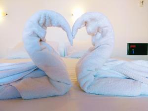 A bed or beds in a room at Villa Giorgos