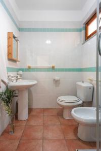 Een badkamer bij Residence Le Pavoncelle