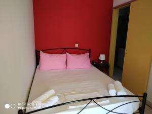 A bed or beds in a room at Apartments Onar