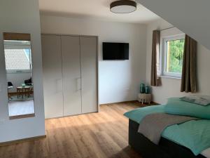 Postel nebo postele na pokoji v ubytování Ferienhaus Feil