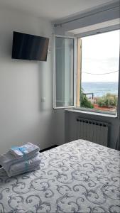 Postel nebo postele na pokoji v ubytování Hotel Aurora