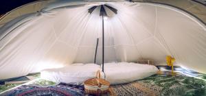 Postel nebo postele na pokoji v ubytování Hoang Indian Tent Camping