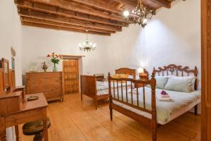 Postel nebo postele na pokoji v ubytování Casa Rural Tamia