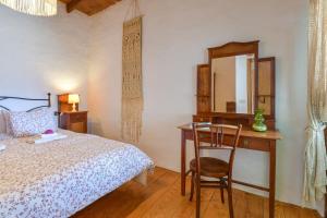 Postel nebo postele na pokoji v ubytování Casa Rural Tamia
