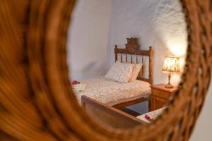 Postel nebo postele na pokoji v ubytování Casa Rural Tamia