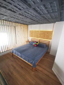 Ένα ή περισσότερα κρεβάτια σε δωμάτιο στο FABRIQ apartment