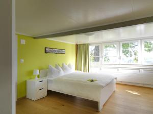 Voodi või voodid majutusasutuse Hotel B&BAlpenheim toas