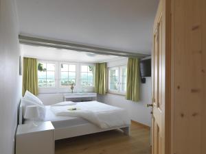 Voodi või voodid majutusasutuse Hotel B&BAlpenheim toas