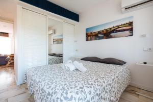 Postel nebo postele na pokoji v ubytování Apartamento Las Brisas II