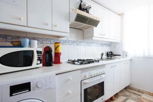 Кухня или мини-кухня в Apartamento Las Brisas II
