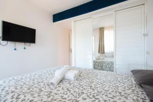 Postel nebo postele na pokoji v ubytování Apartamento Las Brisas II