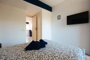 Postel nebo postele na pokoji v ubytování Apartamento Las Brisas II