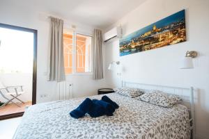 Postel nebo postele na pokoji v ubytování Apartamento Las Brisas II