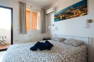 Postel nebo postele na pokoji v ubytování Apartamento Las Brisas II