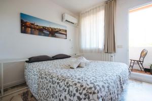 Postel nebo postele na pokoji v ubytování Apartamento Las Brisas II
