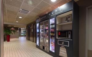 
a vending machine in a mall at Campanile Lyon Centre Part-Dieu in Lyon
