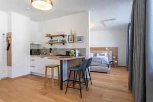 Kuchyňa alebo kuchynka v ubytovaní Apartments Galumbo - bleiben & genießen