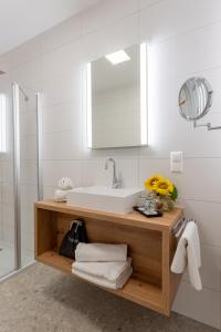 Kúpeľňa v ubytovaní Apartments Galumbo - bleiben & genießen
