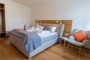 Posteľ alebo postele v izbe v ubytovaní Apartments Galumbo - bleiben & genießen