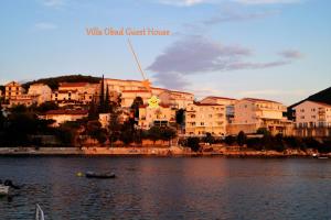 a view of a city from the water at Villa Obad Guest House in Neum