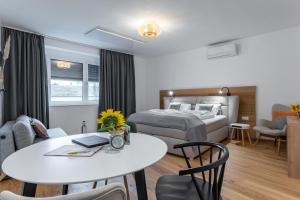 Posteľ alebo postele v izbe v ubytovaní Apartments Galumbo - bleiben & genießen