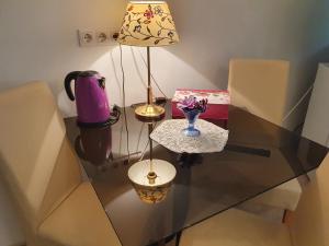 A seating area at Karmelita Boutique Apartman