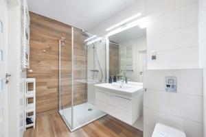 Kúpeľňa v ubytovaní Apartamenty Sun & Snow Nadmorskie Tarasy z basenem