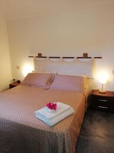 Ένα ή περισσότερα κρεβάτια σε δωμάτιο στο Holiday home Dammuso Magia +58 φωτογραφίες