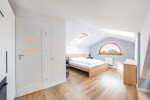 Postel nebo postele na pokoji v ubytování Apartamenty Sun & Snow Międzyzdroje Promenada