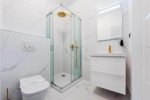 Koupelna v ubytování Apartamenty Sun & Snow Międzyzdroje Promenada