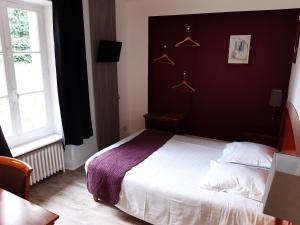 Ένα ή περισσότερα κρεβάτια σε δωμάτιο στο Auberge de la marquise