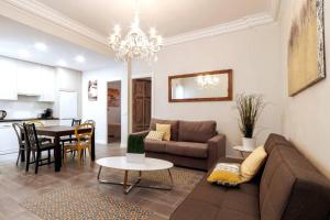 Posezení v ubytování Sensacional Apartamento Junto a Palacio Real by Batuecas