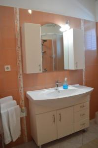 Kúpeľňa v ubytovaní Rooms & Apartments Kvasić