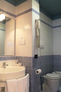 Koupelna v ubytování HOTEL OASI
