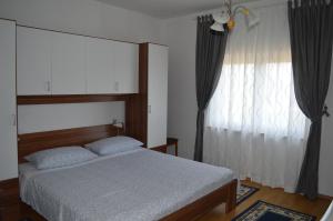 Posteľ alebo postele v izbe v ubytovaní Rooms & Apartments Kvasić