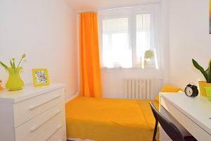 Łóżko lub łóżka w pokoju w obiekcie Apartament nad Strugą