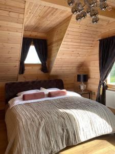 Posteľ alebo postele v izbe v ubytovaní Rezidencia Woodchalet