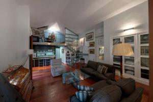 a living room with a couch and a table at JAGUAR in Avila