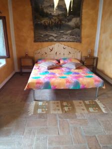 Postel nebo postele na pokoji v ubytování Bed and Breakfast Balli coi Lupi