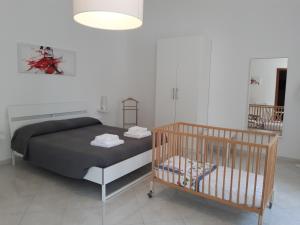 Postel nebo postele na pokoji v ubytování B&B Bell'aria