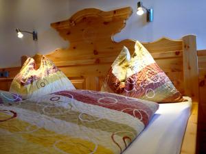 Postel nebo postele na pokoji v ubytování Gasthof Gosausee